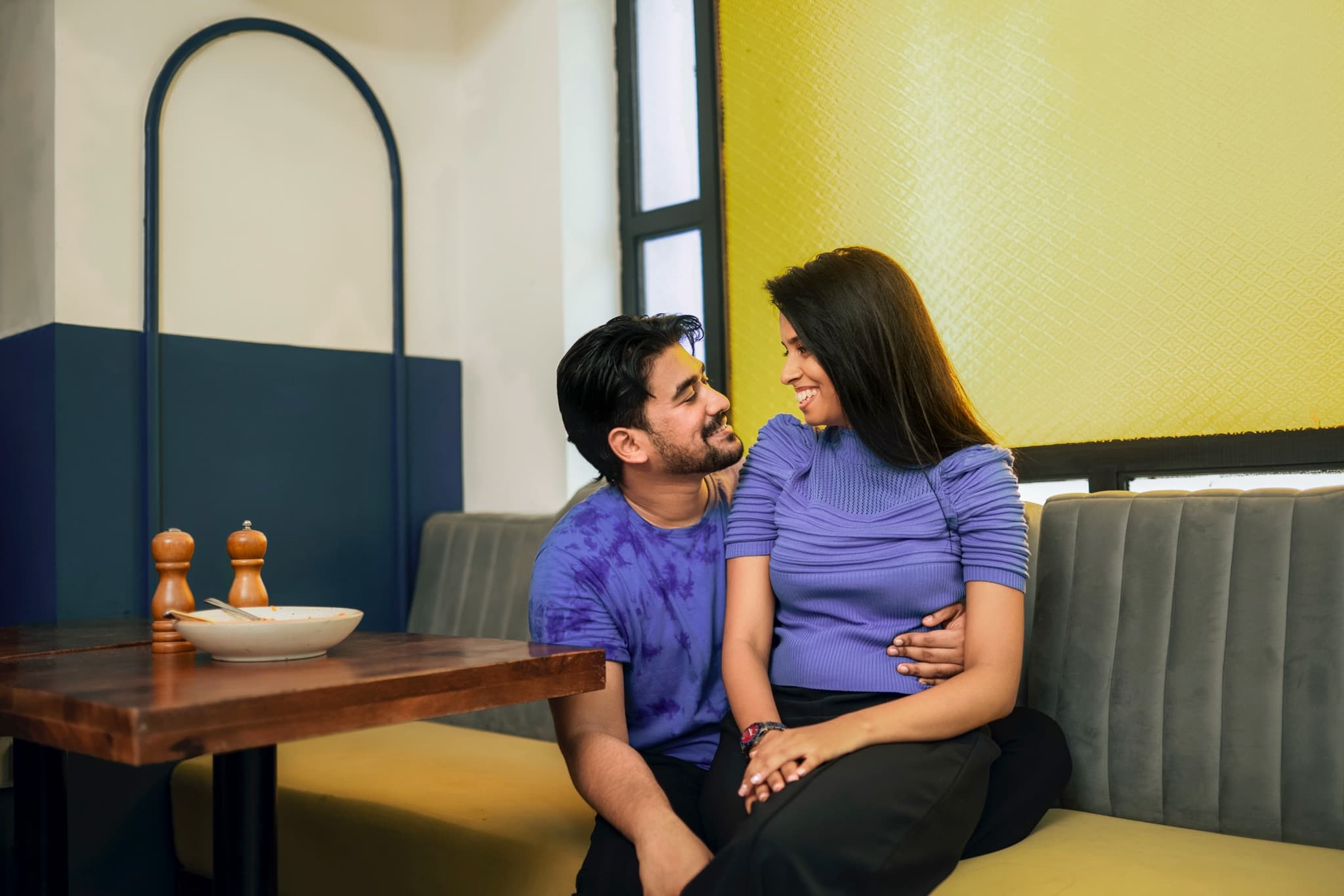Couple discussing wedding plans during consultation