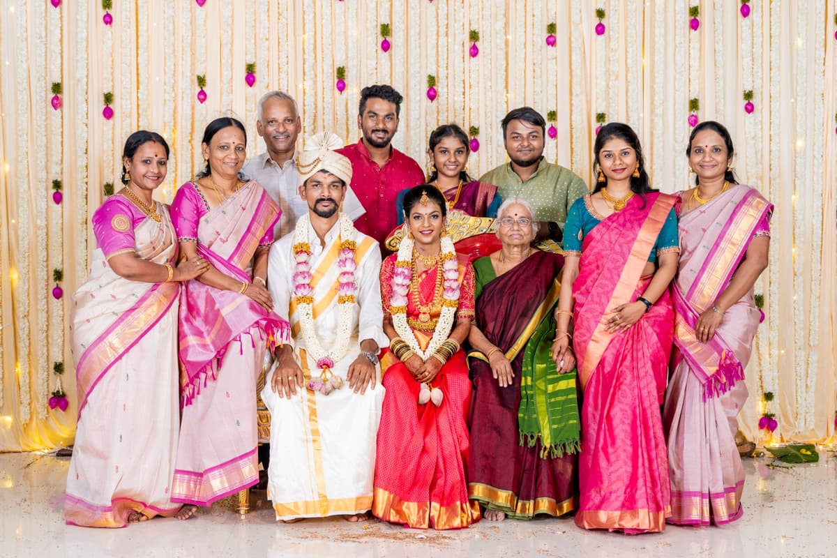 Multi-generational family portrait at a South Indian wedding ceremony