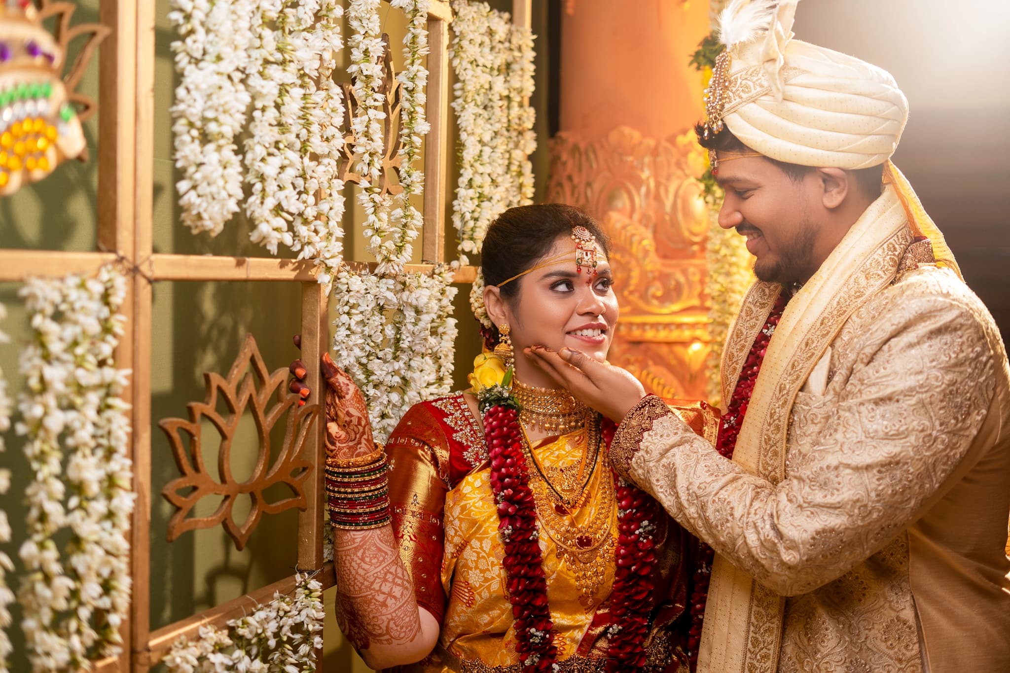 South Indian wedding couple in traditional attire during ceremony